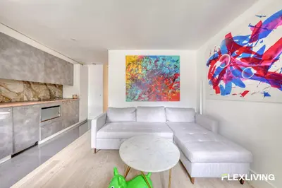 Coin salon dans l'établissement Magnifique T2 parisien élégant et lumineux