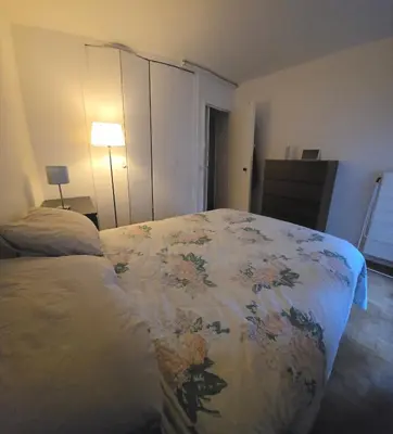 Un ou plusieurs lits dans un hébergement de l'établissement Beau Duplex