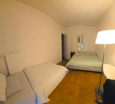 Un ou plusieurs lits dans un hébergement de l'établissement Beau Duplex