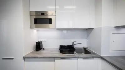 Cuisine ou kitchenette dans l'établissement Sky One La Defense