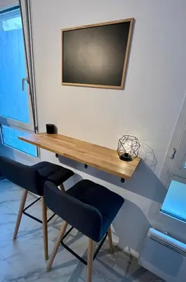 Télévision ou salle de divertissement dans l'établissement Votre cocon Paris La Défense