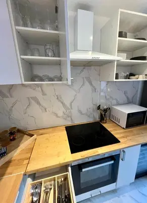 Cuisine ou kitchenette dans l'établissement Votre cocon Paris La Défense