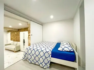 Un ou plusieurs lits dans un hébergement de l'établissement UrbanFlat 223 - Bel Appartement pour 4 Montorgueil