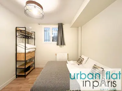 Un ou plusieurs lits dans un hébergement de l'établissement 07 - Best Flat of Grand Boulevard