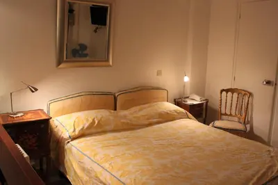 Un ou plusieurs lits dans un hébergement de l'établissement Grand Hôtel du Bel Air