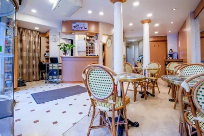 Coin salon dans l'établissement Grand Hôtel du Bel Air