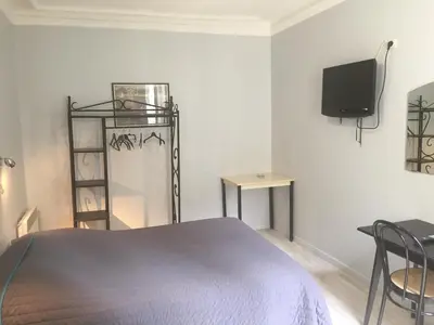 Un ou plusieurs lits dans un hébergement de l'établissement Hôtel Allety