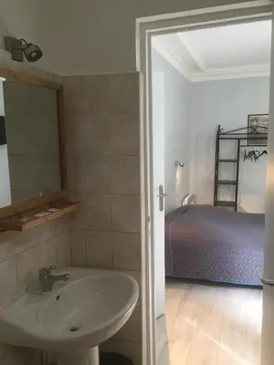 Un ou plusieurs lits dans un hébergement de l'établissement Hôtel Allety