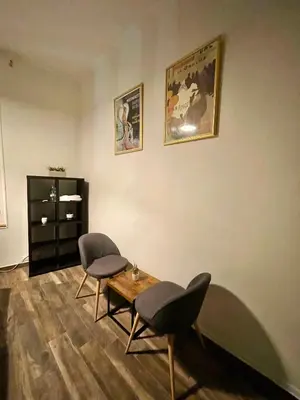 Coin salon dans l'établissement LE Globe