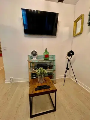 Télévision ou salle de divertissement dans l'établissement LE Globe
