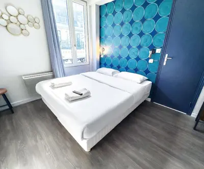 Un ou plusieurs lits dans un hébergement de l'établissement Plug inn Montmartre by Hiphophostels