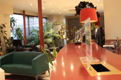 Coin salon dans l'établissement Hotel Hauteville Opera