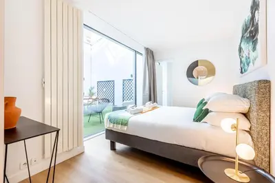 Un ou plusieurs lits dans un hébergement de l'établissement Sweett - Pavillon Lumiere