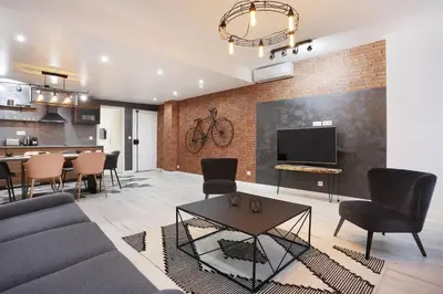 Télévision ou salle de divertissement dans l'établissement Rent a Room - Residence Bonne Nouvelle