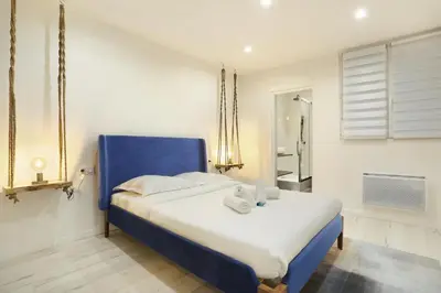 Un ou plusieurs lits dans un hébergement de l'établissement Rent a Room - Residence Bonne Nouvelle