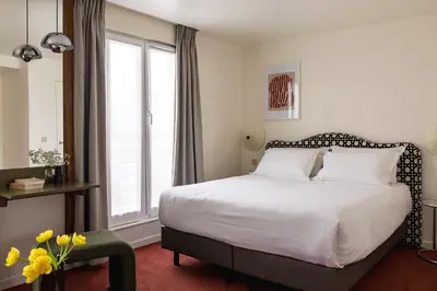 Un ou plusieurs lits dans un hébergement de l'établissement Hôtel Dalila- Orso Hotels