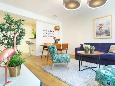 Coin salon dans l'établissement Rent a Room - Residence Caire, Montorgueil
