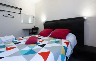 Un ou plusieurs lits dans un hébergement de l'établissement Hotel Europe BLV