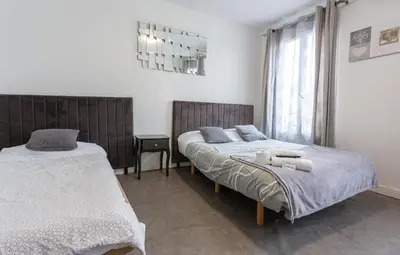 Un ou plusieurs lits dans un hébergement de l'établissement Hotel Europe BLV