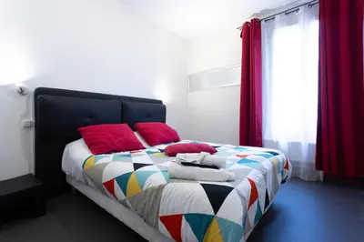 Un ou plusieurs lits dans un hébergement de l'établissement Hotel Europe BLV