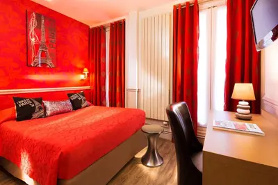 Un ou plusieurs lits dans un hébergement de l'établissement Hotel De La Cite Rougemont