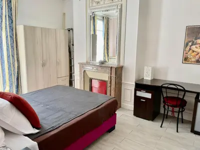 Un ou plusieurs lits dans un hébergement de l'établissement Haussmann Opera Penthouses 130M2