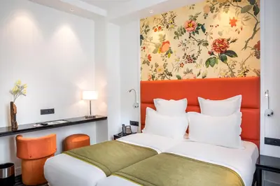 Un ou plusieurs lits dans un hébergement de l'établissement Hotel Scarlett