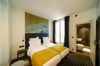 Un ou plusieurs lits dans un hébergement de l'établissement Hotel Scarlett