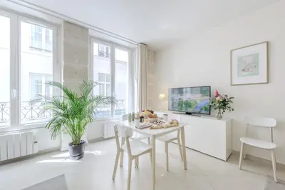 Coin salon dans l'établissement Jardin Saint Honoré Apartments