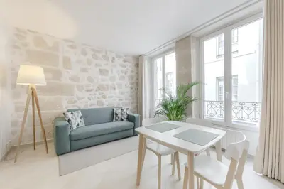 Coin salon dans l'établissement Jardin Saint Honoré Apartments