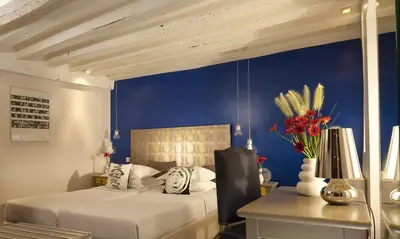 Un ou plusieurs lits dans un hébergement de l'établissement Hôtel Sèvres Saint Germain