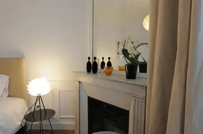 Un ou plusieurs lits dans un hébergement de l'établissement Relais12bis Bed & Breakfast By Eiffel Tower