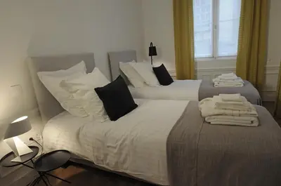 Un ou plusieurs lits dans un hébergement de l'établissement Relais12bis Bed & Breakfast By Eiffel Tower