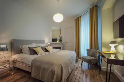 Un ou plusieurs lits dans un hébergement de l'établissement Relais12bis Bed & Breakfast By Eiffel Tower