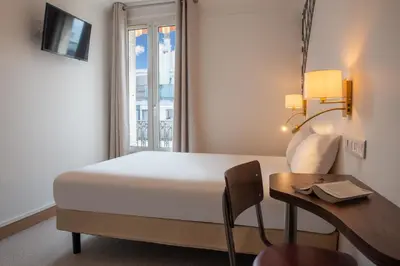 Télévision ou salle de divertissement dans l'établissement Pacific Hotel Fondary