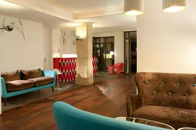 Coin salon dans l'établissement Hotel Joyce - Astotel