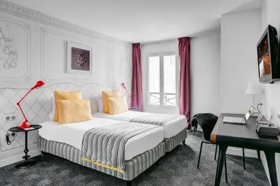 Un ou plusieurs lits dans un hébergement de l'établissement Hotel Joyce - Astotel
