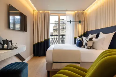 Un ou plusieurs lits dans un hébergement de l'établissement Hôtel Raspail Montparnasse