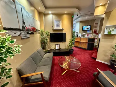 Télévision ou salle de divertissement dans l'établissement Hotel Victor Hugo