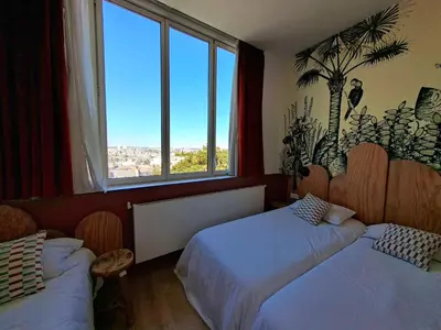 Un ou plusieurs lits dans un hébergement de l'établissement Caulaincourt Montmartre by Hiphophostels