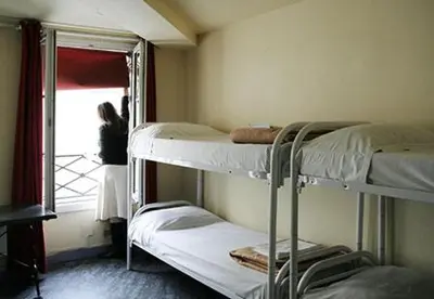Un ou plusieurs lits dans un hébergement de l'établissement Aloha Hostel Eiffel Tower by Hiphophostels