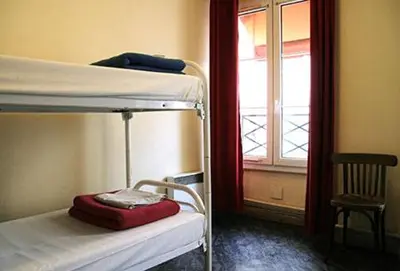 Un ou plusieurs lits dans un hébergement de l'établissement Aloha Hostel Eiffel Tower by Hiphophostels