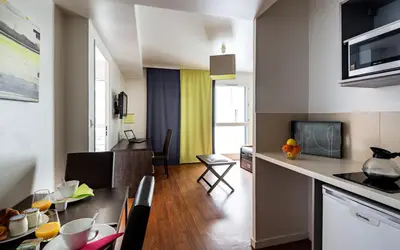 Cuisine ou kitchenette dans l'établissement Lagrange Apart’Hotel Paris-Boulogne