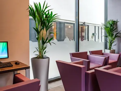 Télévision ou salle de divertissement dans l'établissement Lagrange Apart’Hotel Paris-Boulogne