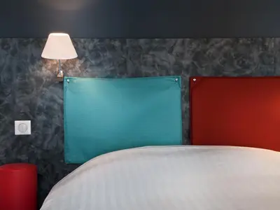 Un ou plusieurs lits dans un hébergement de l'établissement Hôtel des Métallos