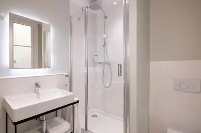 Salle de bains dans l'établissement Hotel De Suez