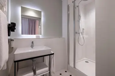 Salle de bains dans l'établissement Hotel De Suez