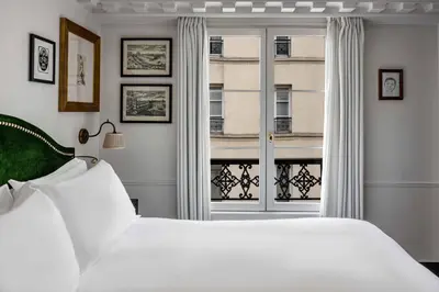 Un ou plusieurs lits dans un hébergement de l'établissement La Chambre du Marais