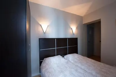 Un ou plusieurs lits dans un hébergement de l'établissement Hotel du Globe 18