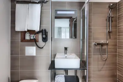 Salle de bains dans l'établissement Le Trente